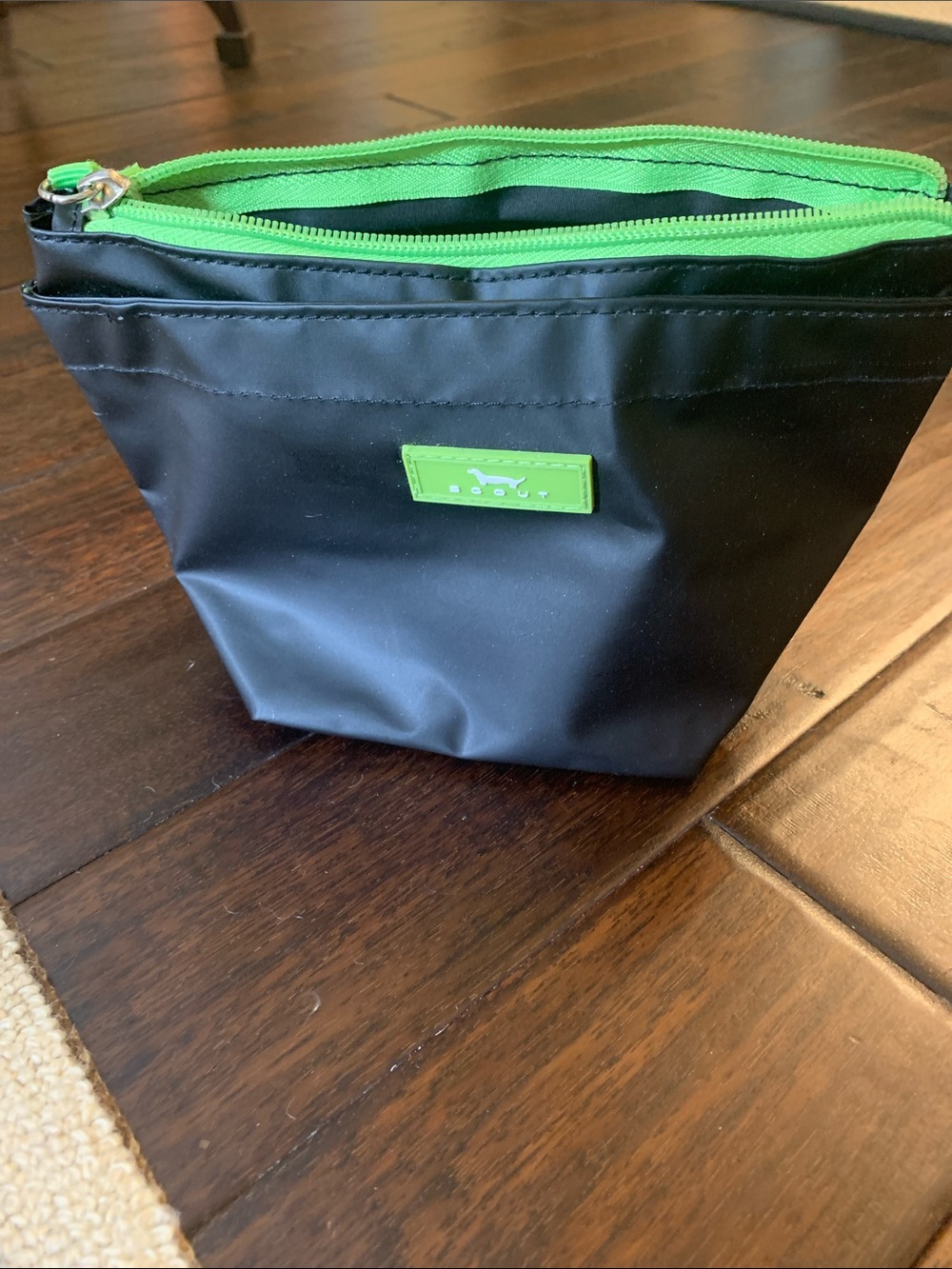 Scout Black Cosmetic Pouch with Lime Green Accents and fun floral interior